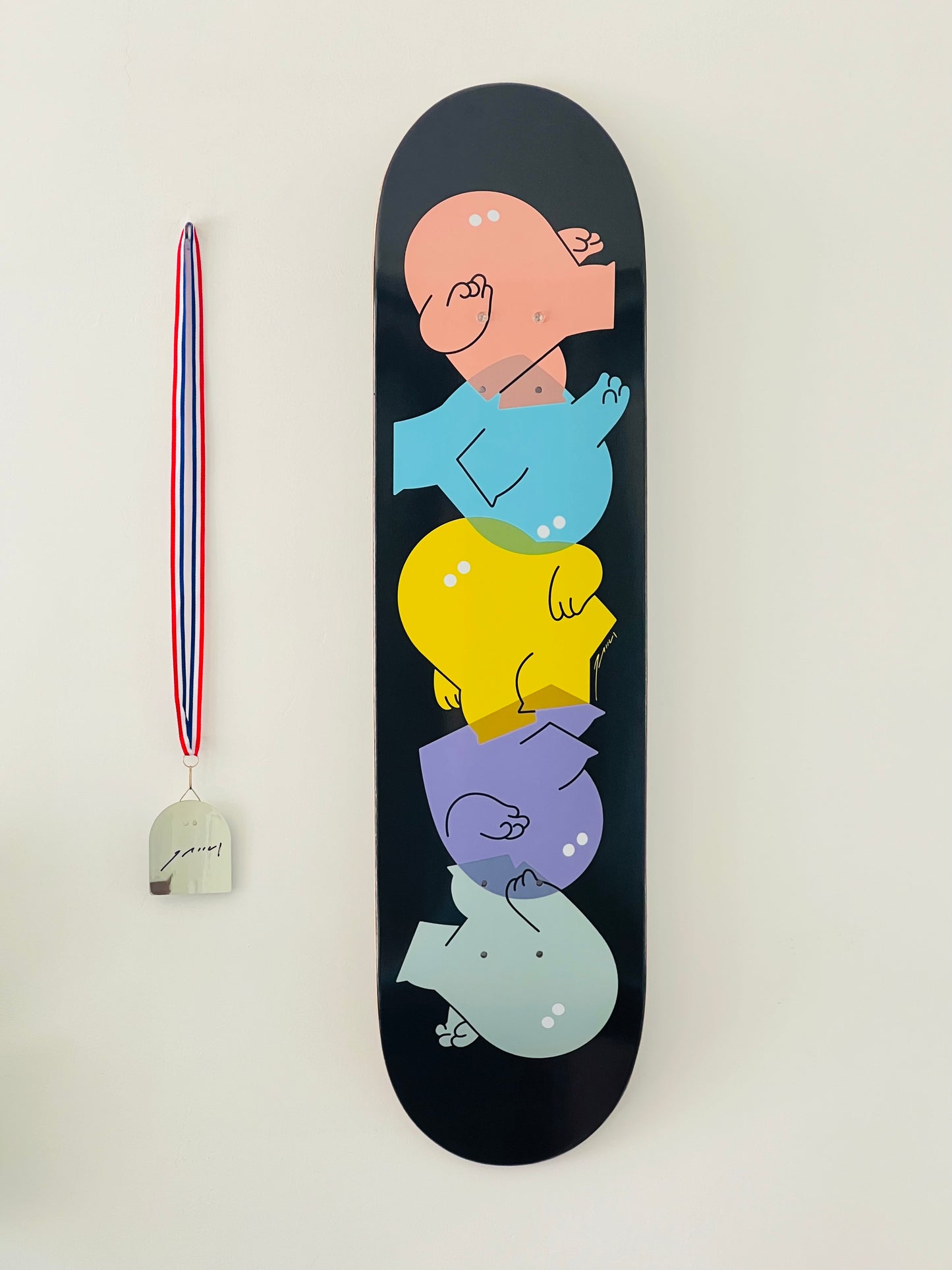 Skateboard garçons ÉMU + médaille d'or dédicacée